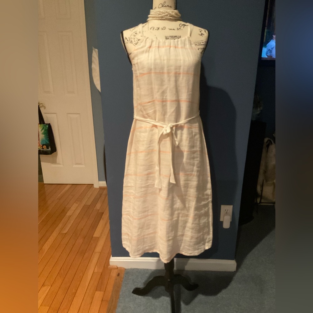 Cream colored with peach strips Sleeveless Sundress.